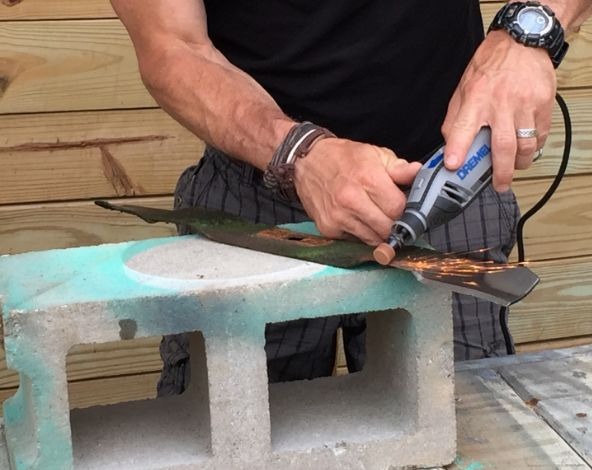 How to Sharpen Lawn Mower Blades With a Grinder